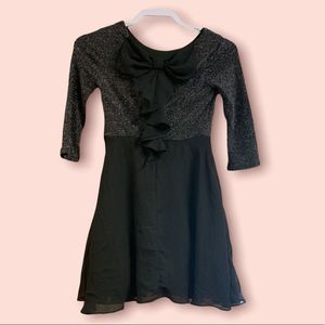 Girls black sparkly flowy dress size 12 from the brand Amy byer